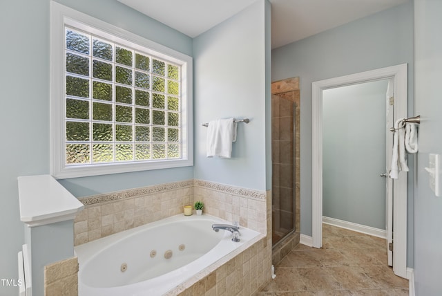 5940 Dahlberg Dr, Raleigh, NC 27603 - bathroom featuring a tub with jets and a stall shower