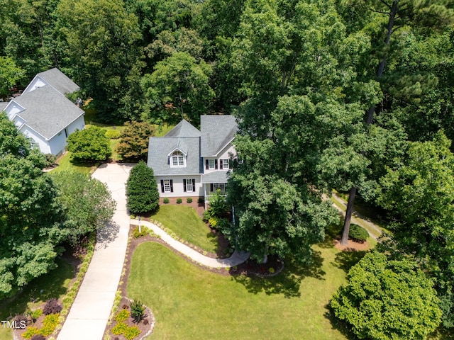 5940 Dahlberg Dr, Raleigh, NC 27603 - view from above of property with a heavily wooded area