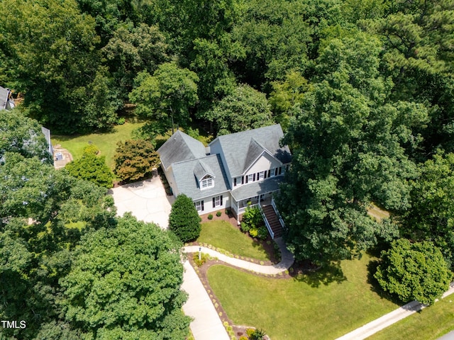 5940 Dahlberg Dr, Raleigh, NC 27603 - aerial view of property and surrounding area featuring a heavily wooded area