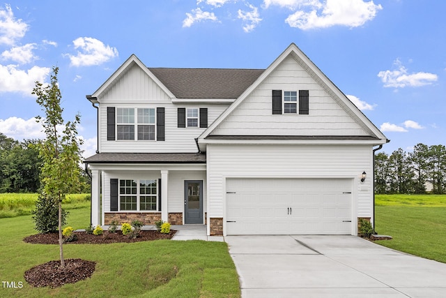 3870 Origin Dr, Bailey, NC 27807 - craftsman house with concrete driveway, board and batten siding, a front yard, and a shingled roof