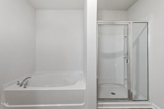 3870 Origin Dr, Bailey, NC 27807 - full bath with a stall shower and a garden tub