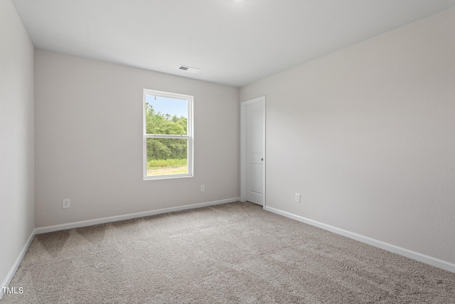 3870 Origin Dr, Bailey, NC 27807 - empty room featuring baseboards and carpet