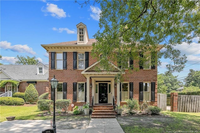 223 Devane St, Fayetteville, NC 28305 - colonial house featuring brick siding