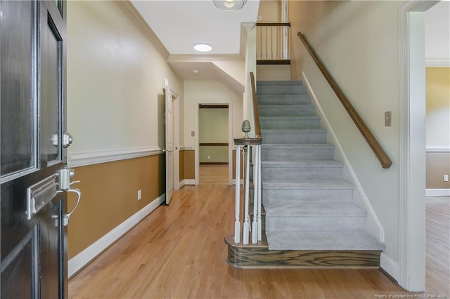 223 Devane St, Fayetteville, NC 28305 - stairs with wood finished floors and crown molding