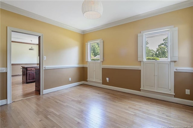 223 Devane St, Fayetteville, NC 28305 - spare room with light wood-style floors and ornamental molding