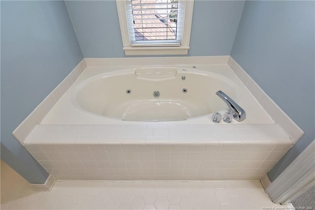 223 Devane St, Fayetteville, NC 28305 - bathroom featuring a tub with jets