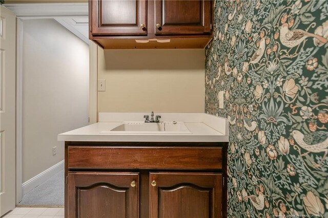 223 Devane St, Fayetteville, NC 28305 - bathroom featuring wallpapered walls and vanity