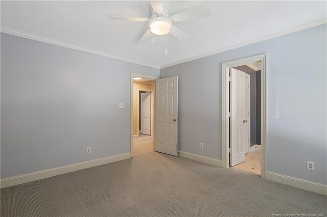 223 Devane St, Fayetteville, NC 28305 - unfurnished bedroom with crown molding, carpet floors, and ceiling fan