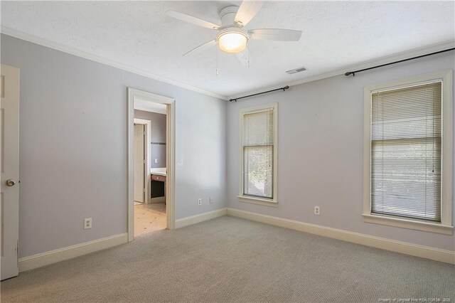 223 Devane St, Fayetteville, NC 28305 - empty room with carpet floors, crown molding, and ceiling fan
