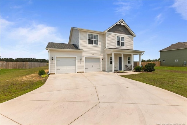 360 Carolina Church Rd, Saint Paul, NC 28384 - view of front of house with concrete driveway, an attached garage, and covered porch