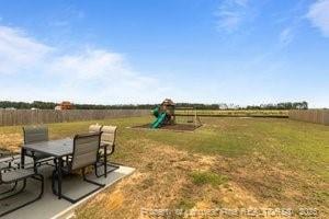 360 Carolina Church Rd, Saint Paul, NC 28384 - view of yard featuring outdoor dining area