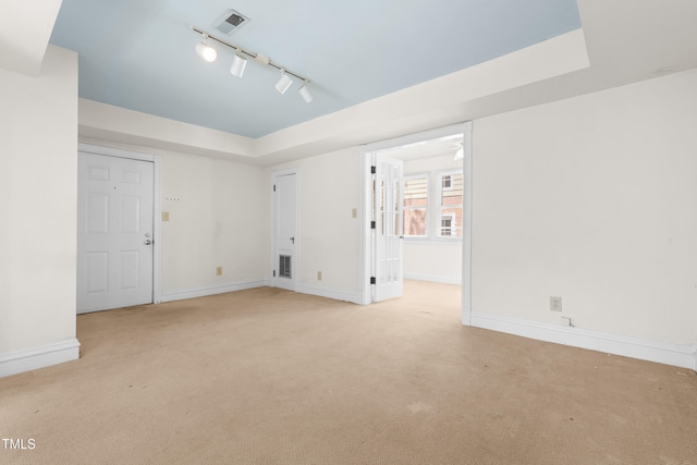 235 Mccauley St Unit # D, Chapel Hill, NC 27516 - spare room featuring light colored carpet and track lighting