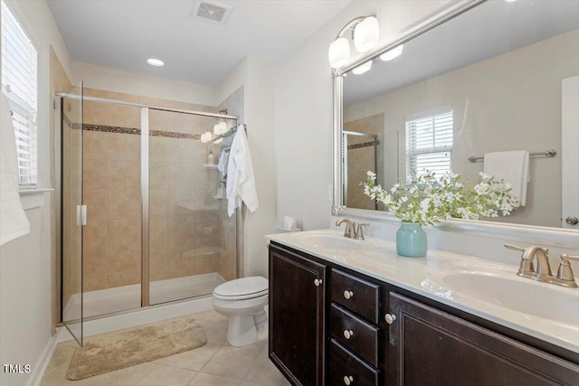 7879 Allscott Way, Raleigh, NC 27612 - full bathroom with tile patterned floors, double vanity, and a shower stall