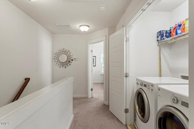 7879 Allscott Way, Raleigh, NC 27612 - laundry area with washing machine and dryer and light colored carpet