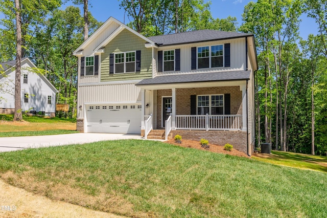 3013 Wesley Farm Ln, Sophia, NC 27350 - view of front of house with a porch, board and batten siding, an attached garage, concrete driveway, and a front yard