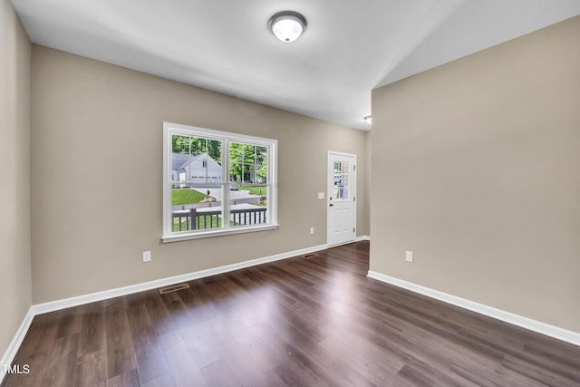 3013 Wesley Farm Ln, Sophia, NC 27350 - empty room with dark wood-style floors and vaulted ceiling