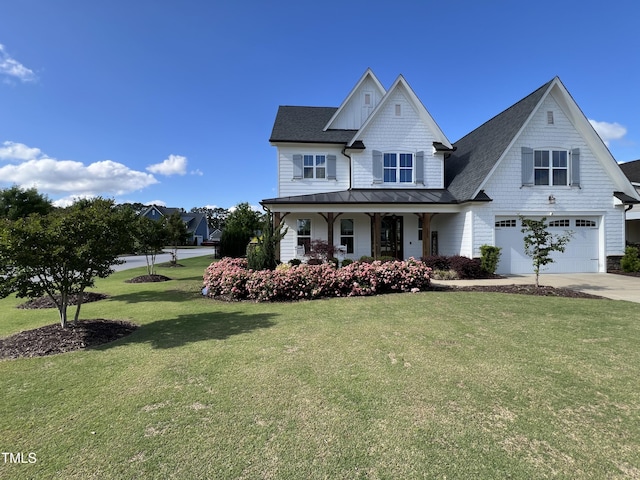 1255 Dairy Glen Dr, Fuquay Varina, NC 27526 - view of front facade with an attached garage, a standing seam roof, covered porch, concrete driveway, and a front lawn