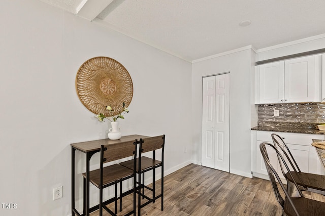 7002 Longstreet Dr Unit C, Raleigh, NC 27615 - dining room with dark wood finished floors and crown molding