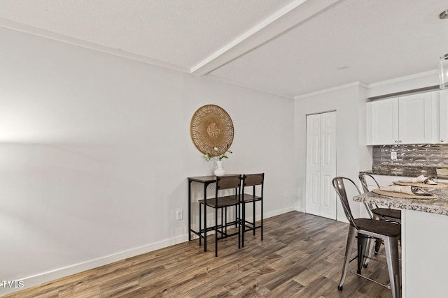 7002 Longstreet Dr Unit C, Raleigh, NC 27615 - dining area featuring dark wood finished floors and baseboards