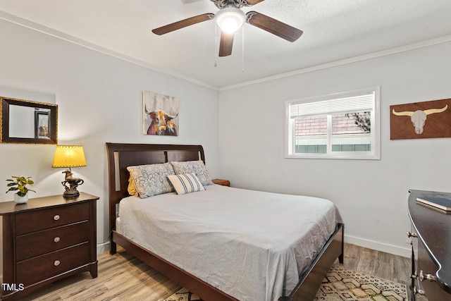 7002 Longstreet Dr Unit C, Raleigh, NC 27615 - bedroom featuring light wood-type flooring, ornamental molding, and a ceiling fan