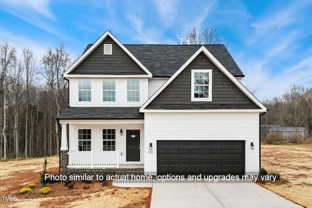 5428 Jaeger Dr Lot # 45, Graham, NC 27253 - craftsman-style home featuring concrete driveway, covered porch, and a shingled roof
