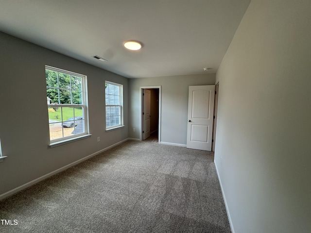 5428 Jaeger Dr Lot # 45, Graham, NC 27253 - unfurnished bedroom featuring carpet and baseboards