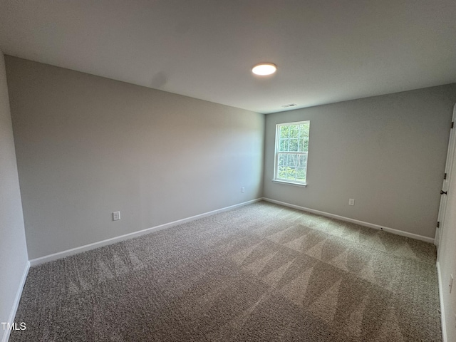5428 Jaeger Dr Lot # 45, Graham, NC 27253 - carpeted spare room with baseboards