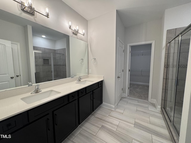 5428 Jaeger Dr Lot # 45, Graham, NC 27253 - full bathroom with a shower stall, a walk in closet, and double vanity