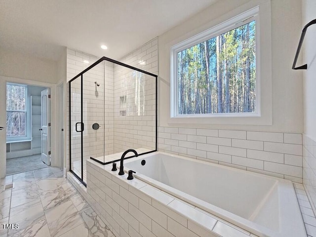 5545 Silk Hope Gum Springs Rd, Siler City, NC 27344 - full bathroom featuring a garden tub, a stall shower, and marble finish flooring