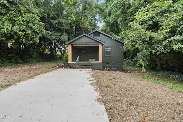 1219 Carlton Ave, Raleigh, NC 27606 - bungalow-style home featuring crawl space, covered porch, and driveway