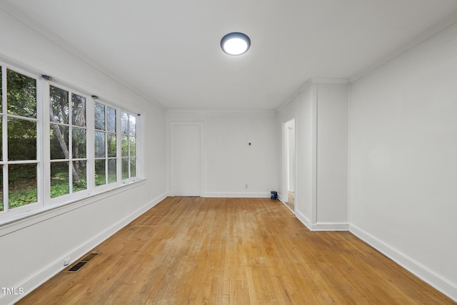 1219 Carlton Ave, Raleigh, NC 27606 - unfurnished room featuring light wood-style flooring and baseboards