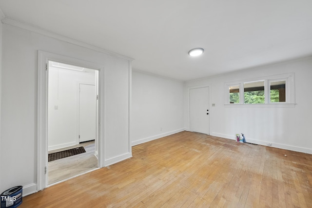 1219 Carlton Ave, Raleigh, NC 27606 - entrance foyer featuring light wood-type flooring and baseboards