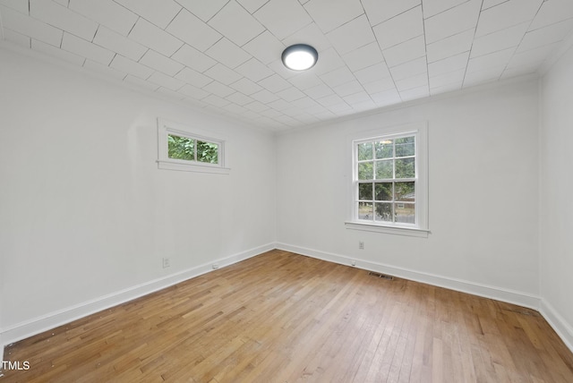 1219 Carlton Ave, Raleigh, NC 27606 - unfurnished room featuring light wood finished floors and baseboards