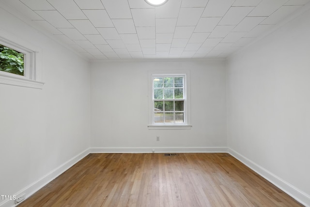 1219 Carlton Ave, Raleigh, NC 27606 - unfurnished room with light wood-style floors and baseboards