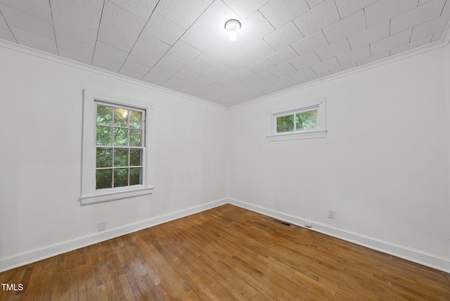1219 Carlton Ave, Raleigh, NC 27606 - unfurnished room featuring hardwood / wood-style flooring and ornamental molding