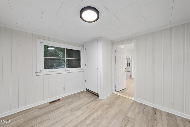 1219 Carlton Ave, Raleigh, NC 27606 - spare room with light wood-style flooring and plenty of natural light
