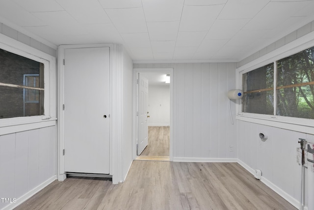 1219 Carlton Ave, Raleigh, NC 27606 - spare room with light wood-style flooring and baseboards