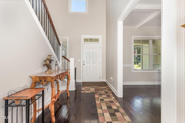 1726 Rapids Ct, Franklinton, NC 27525 - foyer entrance with stairway, healthy amount of natural light, dark wood-style floors, beamed ceiling, and a high ceiling