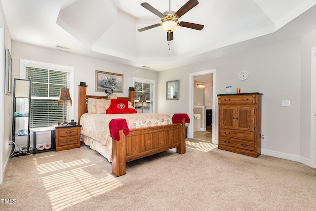 1726 Rapids Ct, Franklinton, NC 27525 - bedroom with a raised ceiling, light colored carpet, ceiling fan, and ensuite bathroom