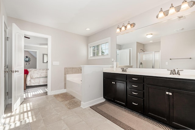 1726 Rapids Ct, Franklinton, NC 27525 - bathroom with a bath, double vanity, a shower stall, ensuite bathroom, and tile patterned flooring