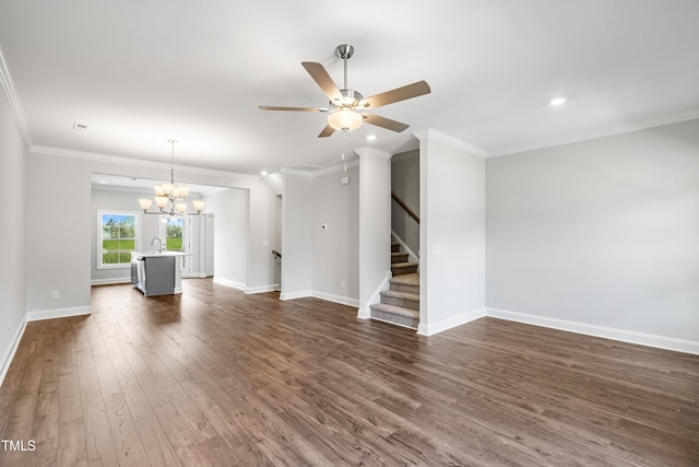 547 Forestville Rd, Wake Forest, NC 27587 - unfurnished living room featuring stairway, a chandelier, dark wood-type flooring, ceiling fan, and ornamental molding