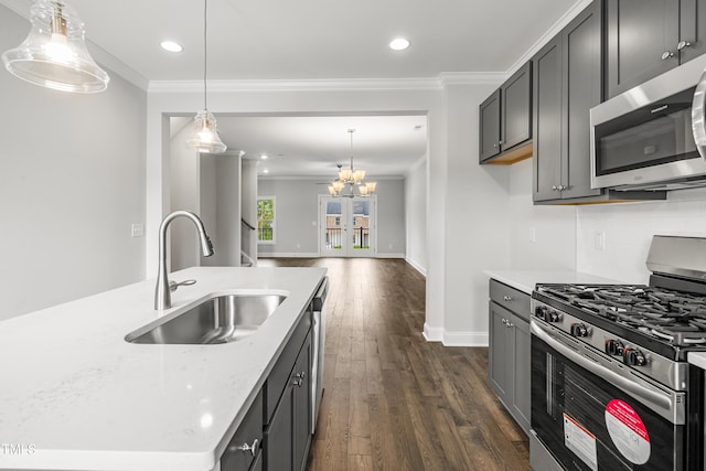 547 Forestville Rd, Wake Forest, NC 27587 - kitchen with appliances with stainless steel finishes, ornamental molding, dark wood-style floors, recessed lighting, and backsplash