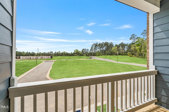 547 Forestville Rd, Wake Forest, NC 27587 - balcony featuring view of wooded area