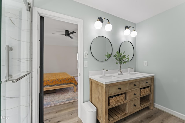 274 Marsh Creek Dr, Garner, NC 27529 - full bath with ensuite bath, wood finished floors, double vanity, a ceiling fan, and a marble finish shower