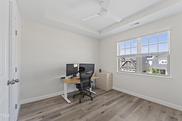 274 Marsh Creek Dr, Garner, NC 27529 - home office with a raised ceiling, wood finished floors, and a ceiling fan