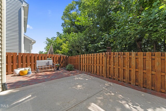 274 Marsh Creek Dr, Garner, NC 27529 - fenced backyard featuring a patio