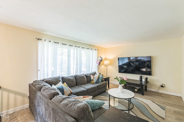 2712 Pebblebrook Dr, Sanford, NC 27330 - living area featuring light wood-style flooring and baseboards
