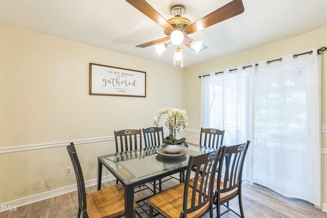 2712 Pebblebrook Dr, Sanford, NC 27330 - dining space featuring light wood finished floors and ceiling fan