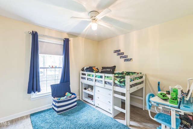 2712 Pebblebrook Dr, Sanford, NC 27330 - bedroom with multiple windows, wood finished floors, and a ceiling fan