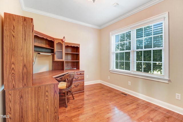106 Woodmere Ln, Goldsboro, NC 27530 - unfurnished office with light wood-type flooring, crown molding, and built in study area